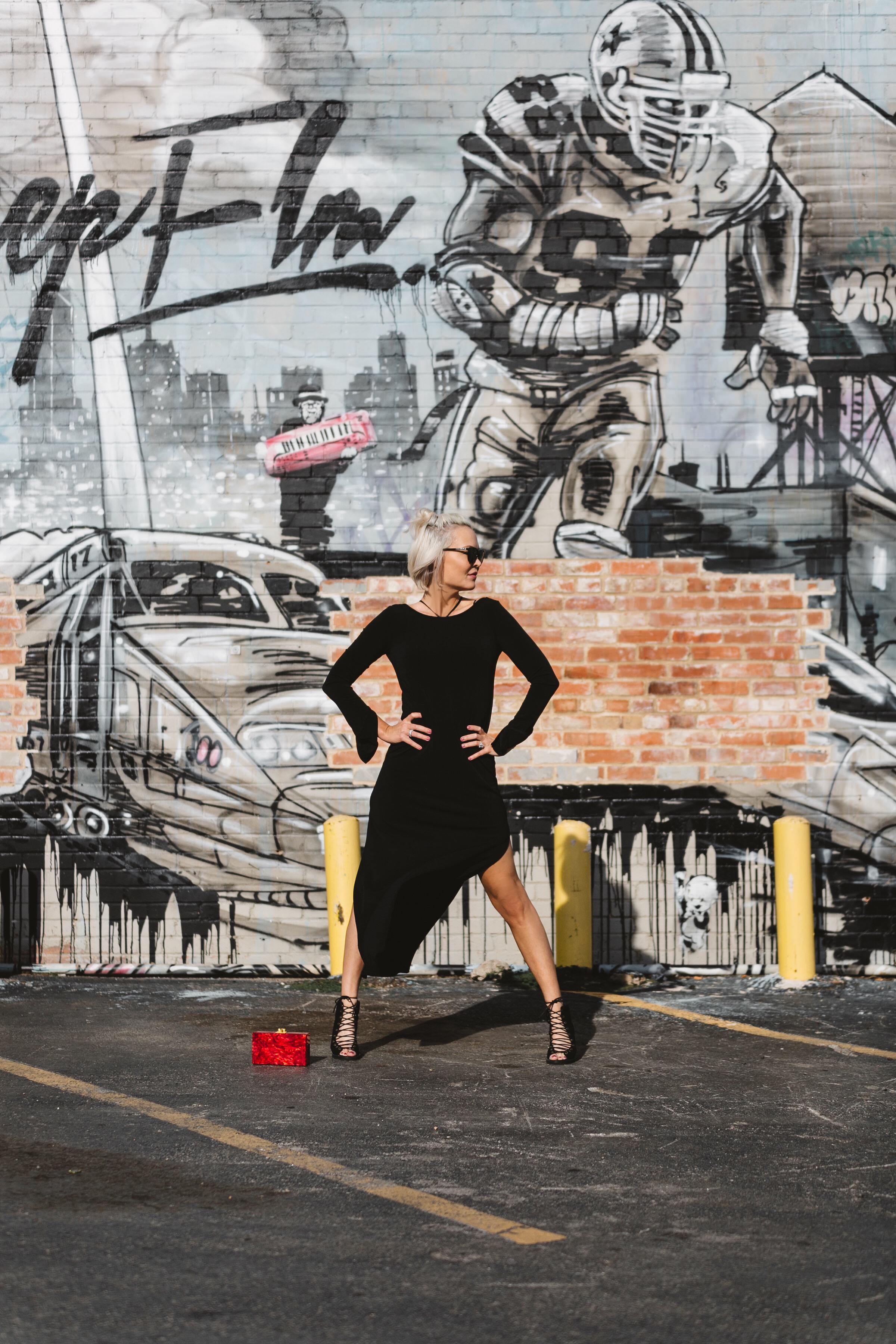 little black dress with black sunglasses and pumps