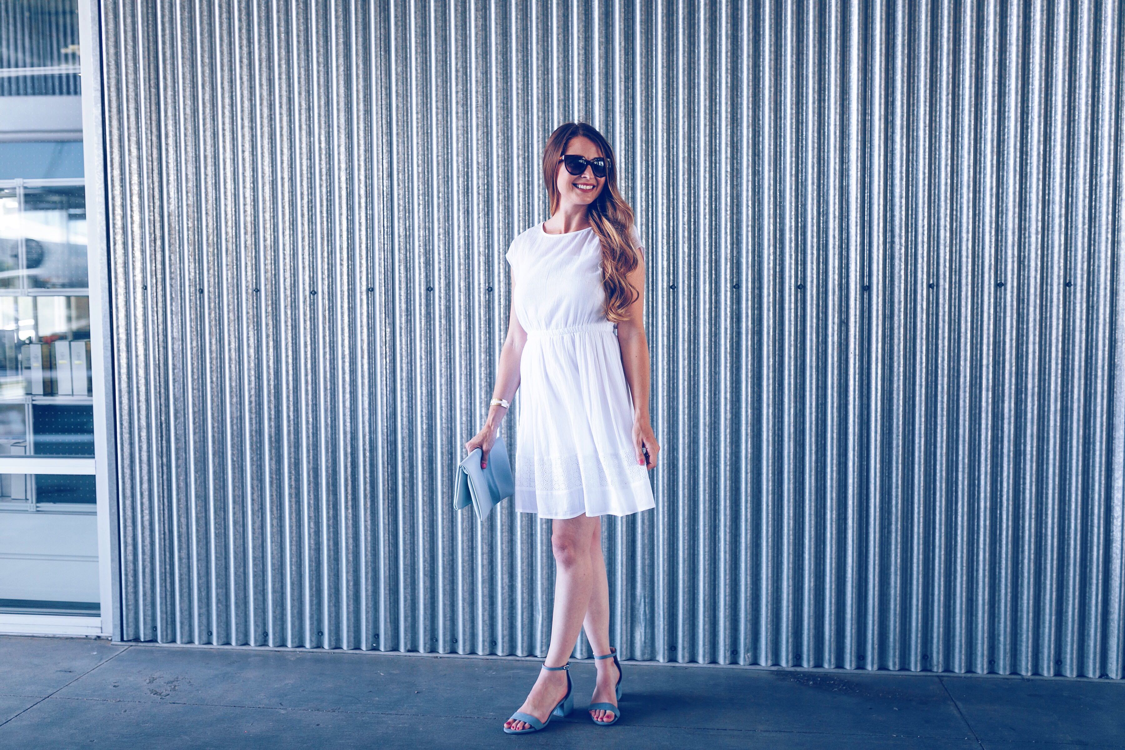 girl in white cotton dress at a blogshoot