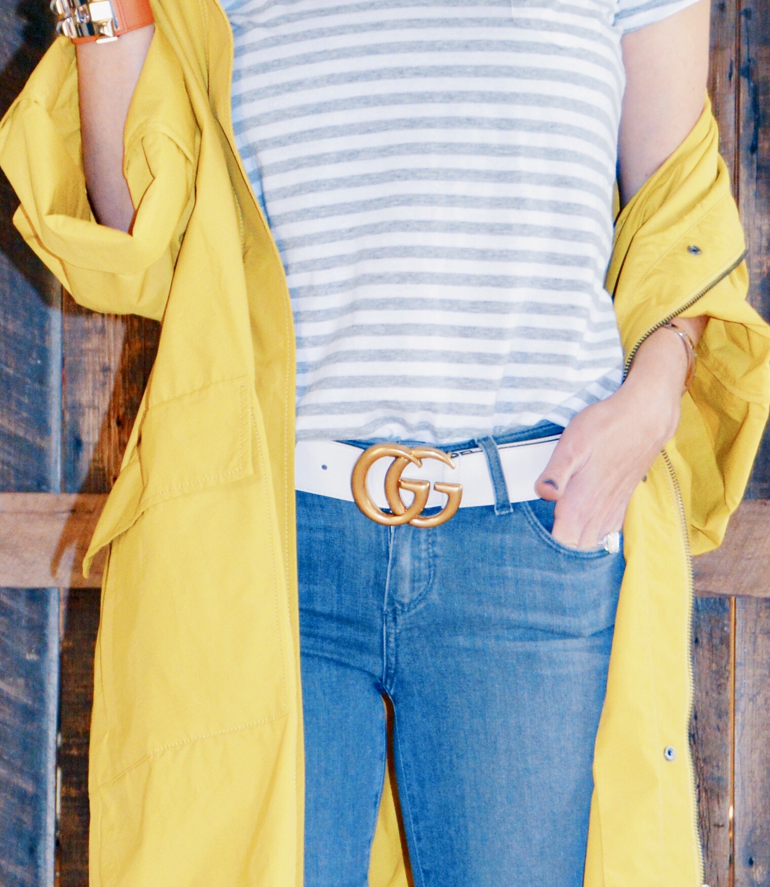 raincoats paired with a wide white belt