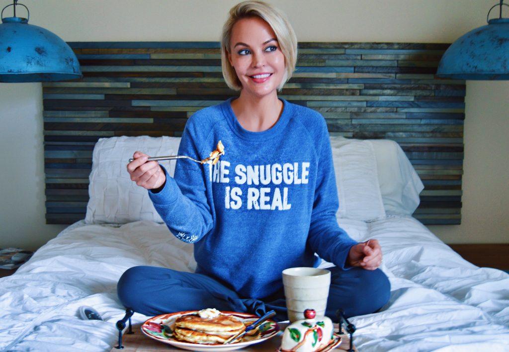 wearing "the snuggle is real" sweatshirt for national pancake day