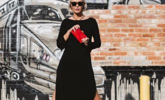 black dress with red purse