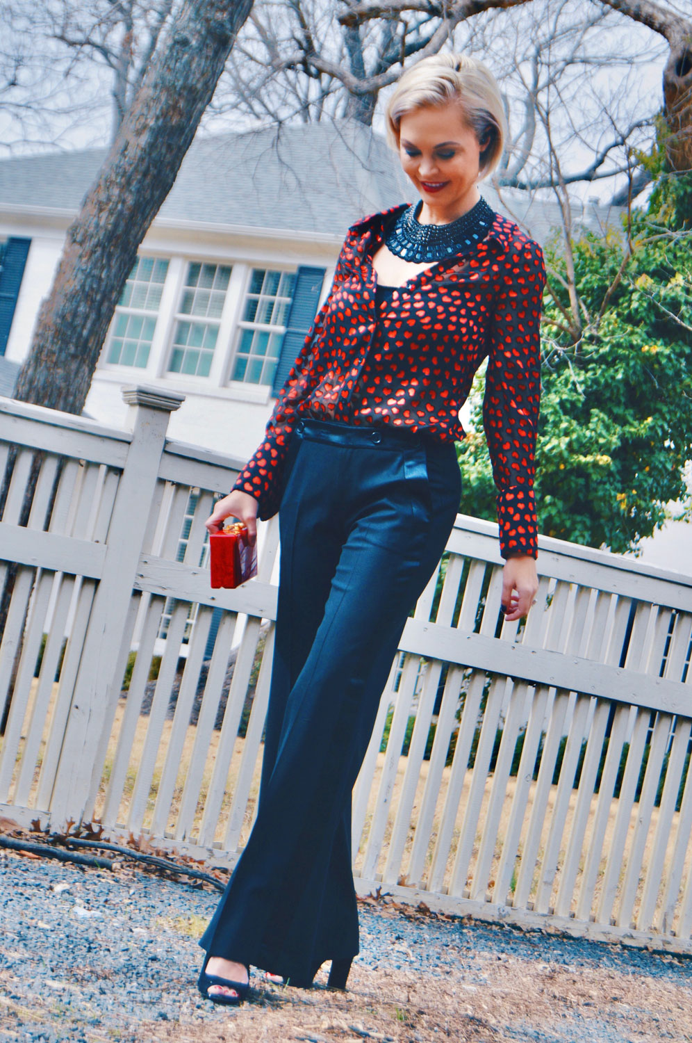 this red clutch pairs perfectly with this outfit themed for empaths