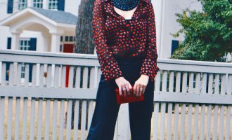 red heart shirt with black pants