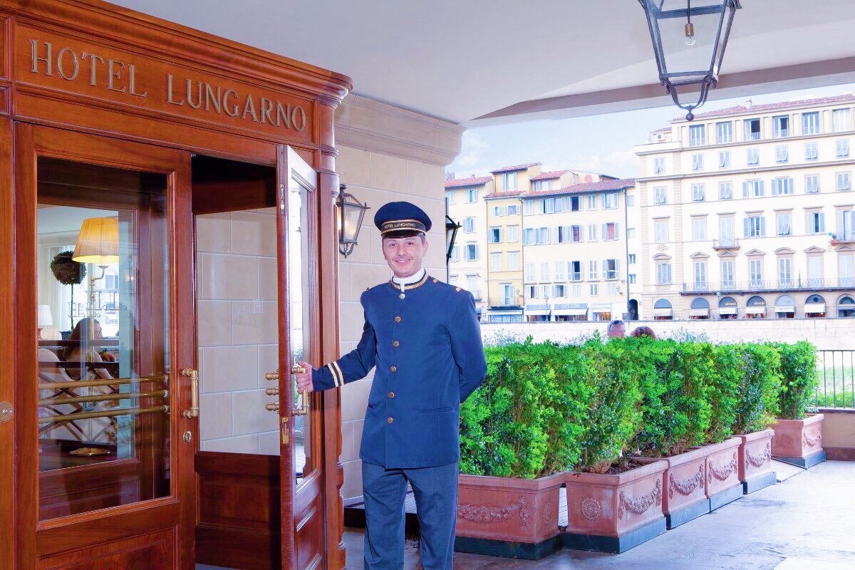 the welcoming doorman at Hotel Lungarno in Florence