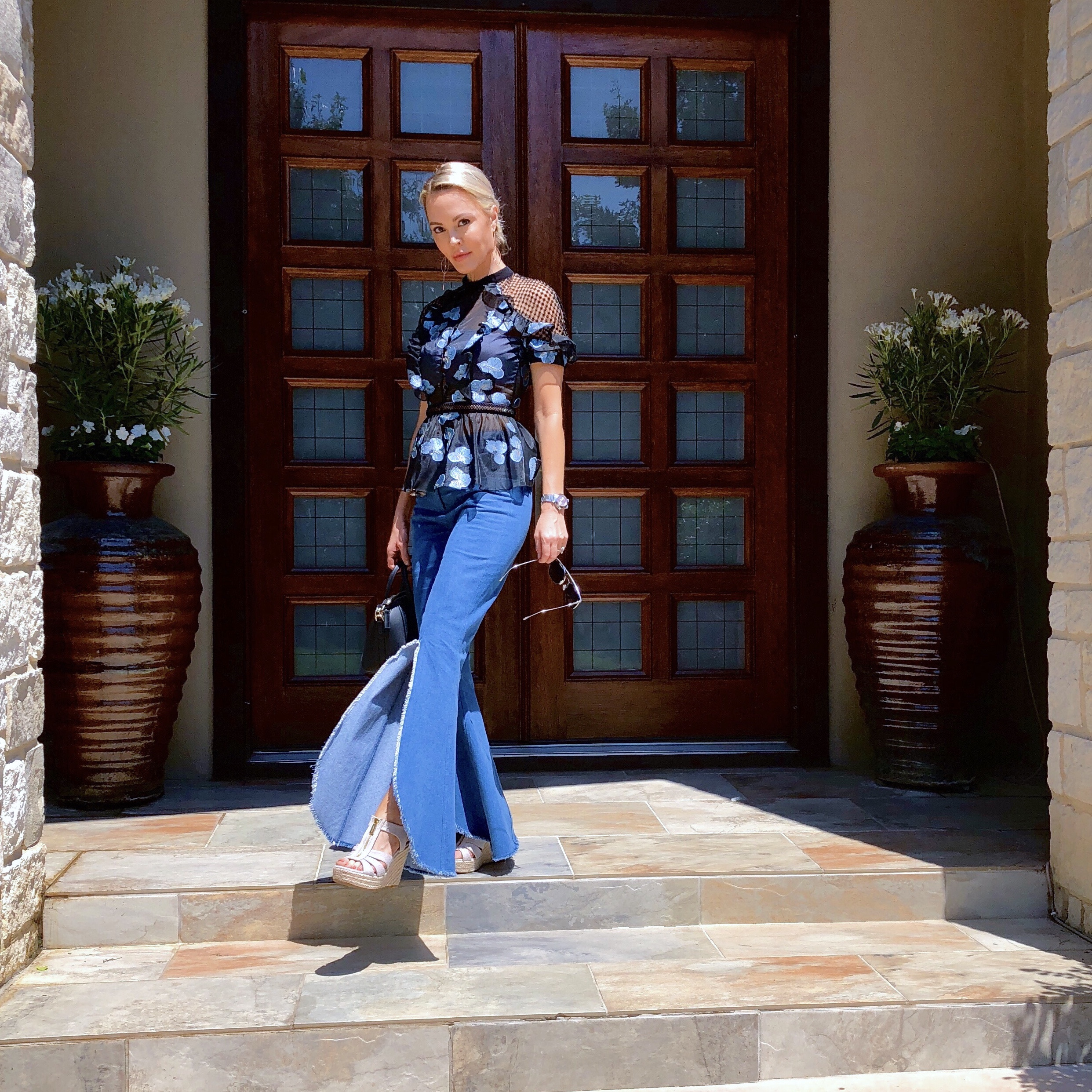 taking the back road in flared jeans and wedges