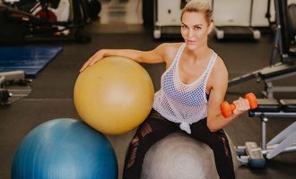 Whitney lifting weights for Women's Health and Fitness Day