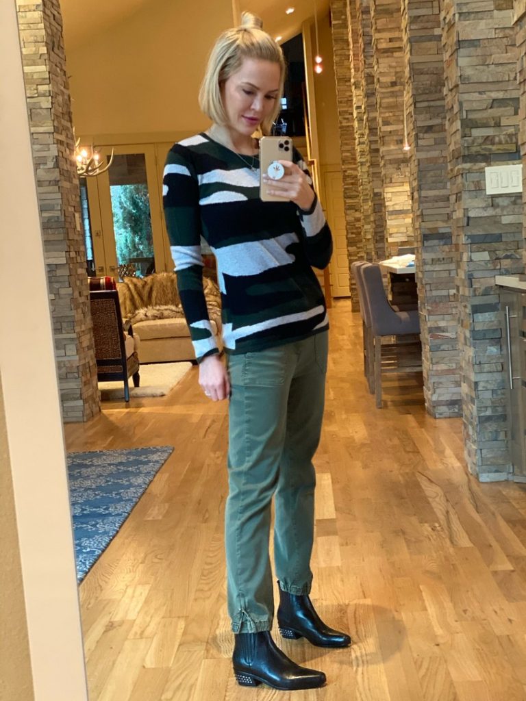 green joggers and a comfortable patterned sweater