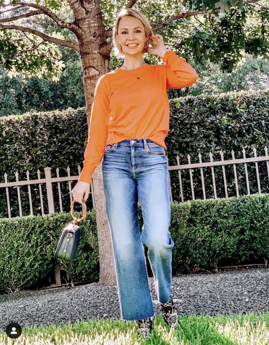 cigarette jeans with an orange tee